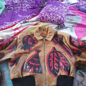Leather tribal patterned jacket